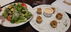 Cesar salad and sausage bites at Ethos Vegan Kitchen in Winter Park