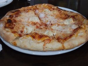 Pizza with ricotta, onions, and garlic at Ethos Vegan Kitchen in Winter Park