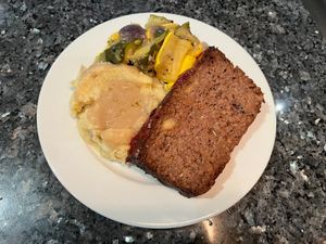 Meatloaf entree served with mashed
potatoes and gravy and roasted vegetables at Ethos Vegan Kitchen in Winter Park