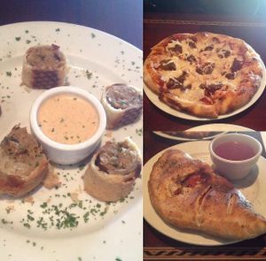 Sausage rolls, meatball, pepperoni and onion pizza, sausage, roasted red pepper and onion calzone at Ethos Vegan Kitchen in Winter Park