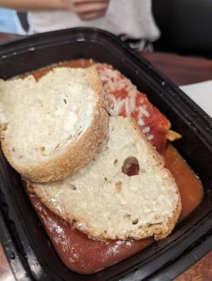 The lasagna itself was smaller than that half slice of bread.  at Vegan Danish Bakery in Toronto