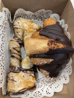 Cinnamon pastry and Boston cream croissant at Vegan Danish Bakery in Toronto