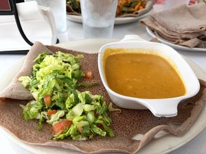 shiro wot, ingera, and salad at Mesob Cafe in Virginia Beach