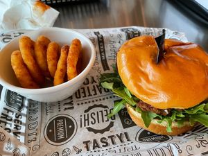 The onion rings were divine and the White Cheddar Chickun Bacon Ranch was amazing! Order this and your mouth will be happy! at Bumbling Bee in Virginia Beach