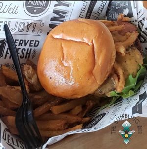Fat, Sexy & Beyond Cheddar Cheese Burger served with house cut fries tossed with cajun house seasoning!  at Bumbling Bee in Virginia Beach