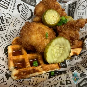 Southern Fried Cali & Waffles with a Jim Beam Maple Bourbon syrup & crispy dill pickles!  at Bumbling Bee in Virginia Beach