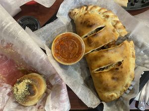 Calzone and single garlic knot  at Bodacious Bakehouse in Virginia Beach
