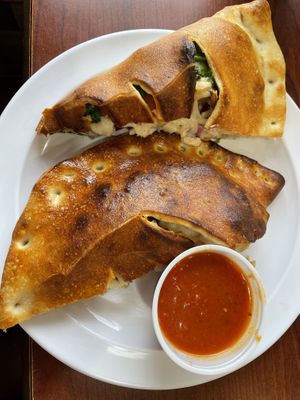 Vegan white chicken mushroom calzone  at Bodacious Bakehouse in Virginia Beach