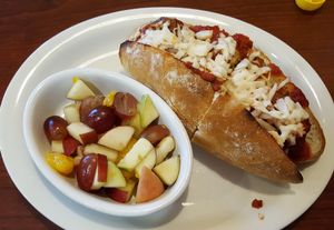 Vegan meatball sub with side of fruit. So tasty! at Bodacious Bakehouse in Virginia Beach