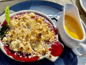 Berry Crumble with vegan custard  at The Drum Inn in Torquay