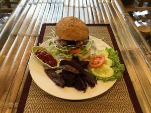 Chicken burger with the choices of homemade sweet potato or chips  at Taste From Heaven in Koh Phangan
