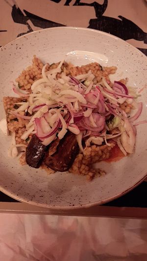 Moroccan-Spiced Aubergine
with giant couscous, red pepper, onion and tomato stew, fennel, radish & red onion salad, coriander and pomegranate. at The Cosy Club in Ipswich