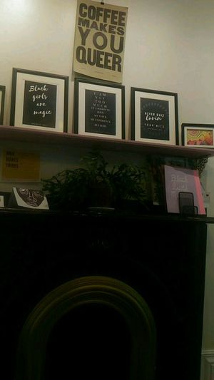 Lovely old fireplaces and art at Glitter Bean in Halifax