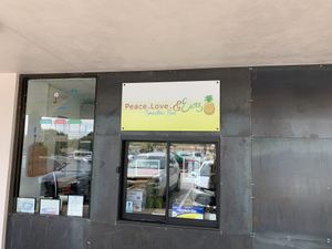 Their only exterior sign, it’s small- so look closely!  at Peace Love & Eatz in Desoto