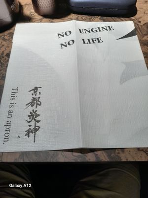 Even paper bibs available :-).  at Kyoto Engine Ramen in Kyoto