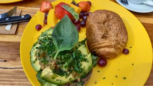 Vegan sandwich, pain au chocolat and fruit salad at Appeltje Eitje - Centre in The Hague