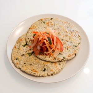 Pol-roti (Sri Lankan flatbread made with shredded coconut, flour, and a mix of spices) at Sri Lankan Curry Bowl in Zagreb