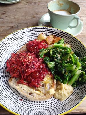Vegan breakfast..hummus , sourdough, potato, greens. Delicious. at The Cow Bog in Londonderry