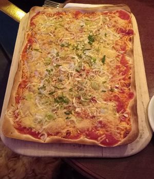 veganisierter flammkuchen käse lauch 11€ at Kollektiv Cafe Klatsch - temporarily closed in Wiesbaden