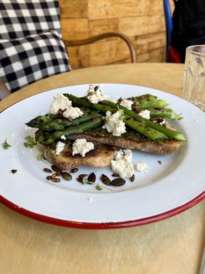 Sourdough toast with pesto, asparagus and vegan feta at Hullabaloo in Ipswich