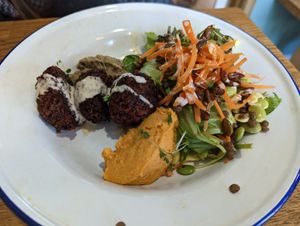 Harissa falafel, carrot hummus, Baba ghanoush and salad at Hullabaloo in Ipswich