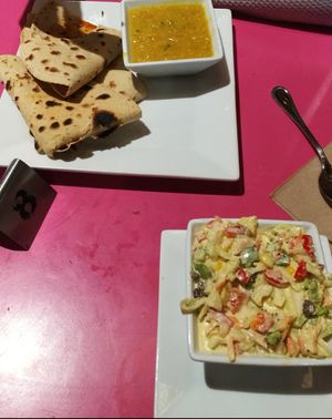 Salad and curry at Sweet Cherubim Restaurant and Bakery in Vancouver