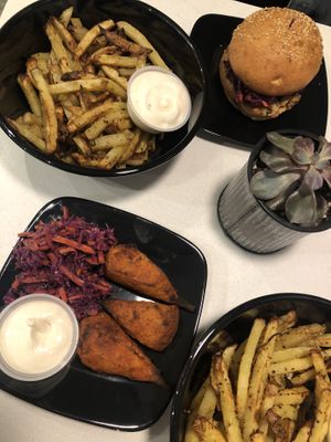 Fries, chicken wings with garlic aïoli at Copper Branch in Kingston