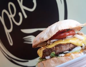 Our famous #pekcheezeburger.
This is the talk of our town. Soya burger with fried tomato and onion. Gherkins and lettuce. Pek sauce. Its a winner! at PEK in Dover
