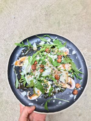 Mushroom carpaccio with parmesan and hazelnuts at Le Caboulot de la Serendipite in Nimes