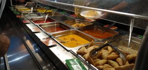 Servery (Vegan, veggie and meat dishes in same hot cabinet but served by personnel using different utensils.) at The Mosque Kitchen in Edinburgh