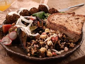 Falafel, moroccan rice, roasted seasonal vegetables at Honest Greens - Hortaleza in Madrid
