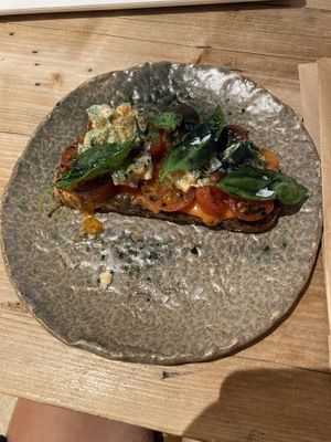 tostada tomata - with vegan feta!  at Honest Greens - Hortaleza in Madrid