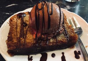 Orange cake with chocolate ice cream - vegan at Bombon in Madrid