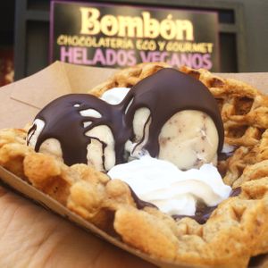 Gluten-free buckwheat flour waffle made with coconut milk, ginger, Camino Verde bean-to-bar chocolate from Ecuador and topped with two scoops of hazlenut and straccia-coco icecream at Bombon in Madrid