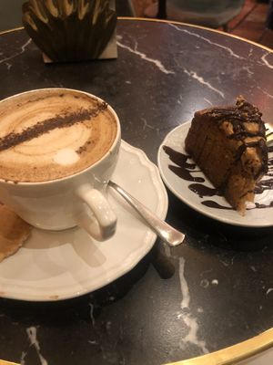 Cake and cappuccino at Bombon in Madrid