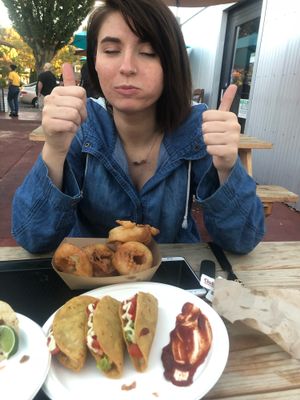 Vegan loaded potato tacos & onion rings!  at The Food Plant Food Truck in Springfield