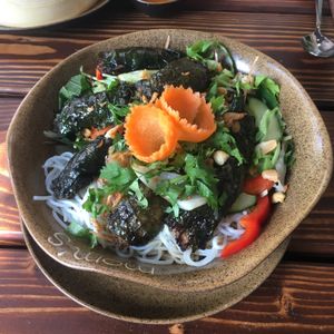 Rice Noodles with tofu mixture wrapped in special leaves. at Mom's Creation - Friedrichshain in Berlin