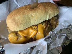 Saucy seitan with cheeze added  at Thank Goodness It's Vegan in Goshen