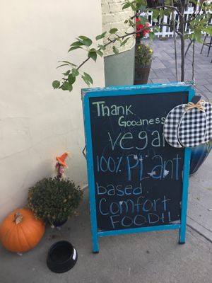 Sidewalk sandwich board at Thank Goodness It's Vegan in Goshen