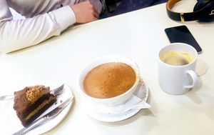 Coconut creme choco cake, HUGE hot choco, and Americano, side by side for scale. at Vegan - Jahamoon in Seoul