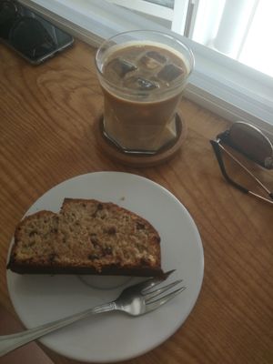 Banana Bread & Iced Latte with oat milk at Coffee & Waves in Lagos