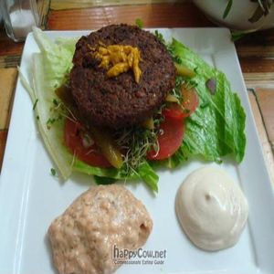 Buddha burger on lettuce plus salad from salad bar at Buddha Burgers - Yehuda HaLevy in Tel Aviv
