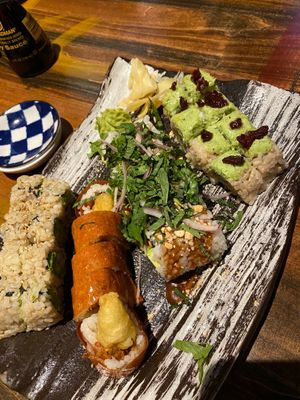 L-R: Veggie roll, Cowgirl, Thai Hippie, Eden  at Blue Sushi Sake Grill - Uptown in Dallas