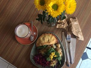 a pasty with a mixed salad and the selfmade golden hummus of the cafe at Megafauna in Southport
