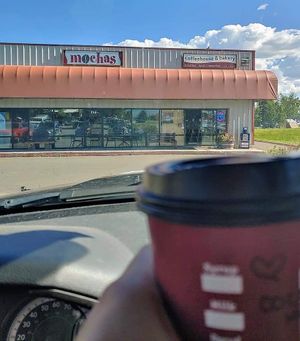 Coconut latte and store front at Mochas Coffeehouse and Bakery in Gunnison
