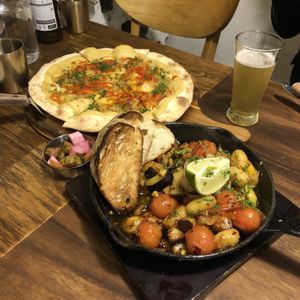 Hummus pizza and gnocchi  at Nammi Plant Lab in Seoul