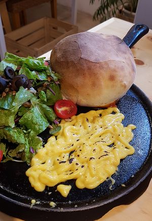 Calzone burger with salad and sauce at Nammi Plant Lab in Seoul