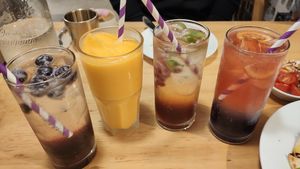 Various colorful ades and Jeju mandarin orange smoothie at Nammi Plant Lab in Seoul