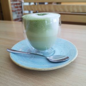 Matcha latte with oat milk at Roots Cafe in Abergele