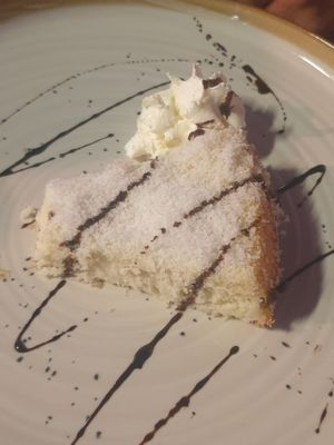 Delicious coconut pie - not vegan, but they always exchange the dessert of the day for a vegan option. at Casa Brasil in Palavas-les-flots